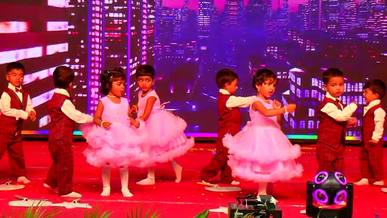 Pre-KG children dancing on stage at Annual Day 2024–25